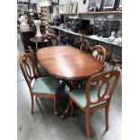 A dining table & 6 chairs
