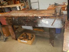 A large work bench with vice.