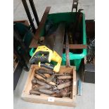 Two boxes of old tools including saws.