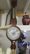 A Victorian mahogany barometer.