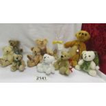 Eight miniature teddy bears and 2 bear figures.