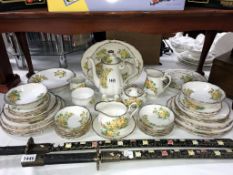 Approximately 60 pieces of Royal Albert 'Tea Rose' tea/dinner set in used/worn condition,