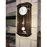 An Acctim Westminster chime wall clock