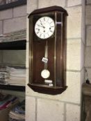 An Acctim Westminster chime wall clock