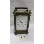 A brass carriage clock with key and in working order.