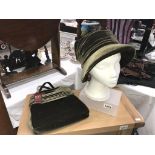 A sage coloured hat & matching handbag by Dents,