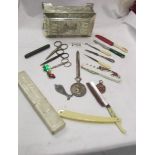 A mixed lot including cased cut throat razor, silver plate box, letter opener etc.