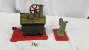 A Mamod stationary steam engine and one accessory.