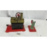 A Mamod stationary steam engine and one accessory.