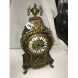 A superb quality buelle mantel clock. in good condition.