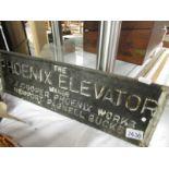 A cast iron sign for Pheonix Elevator, W J Cooper, Pheonix Works, 52 x 16 cm,