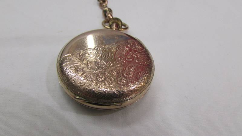 A 9ct gold ladies fob watch on an ornate 9ct gold Albertine, in working order. - Image 3 of 6