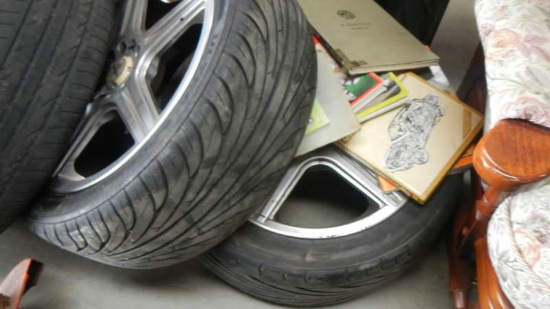 Three wheels with tyres, wheel rims, motoring books etc., (Collect only). - Image 4 of 5