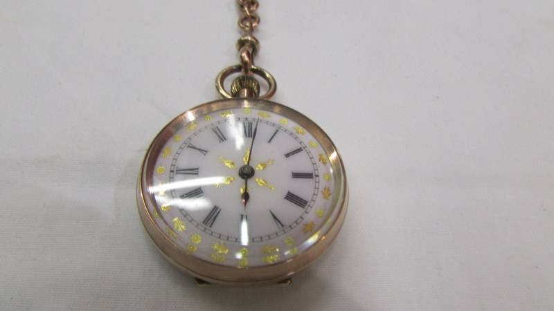 A 9ct gold ladies fob watch on an ornate 9ct gold Albertine, in working order. - Image 2 of 6