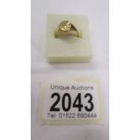 A 9ct gold ring size N. (1.