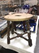 A vintage oak stool with turned legs & cross stretchers with Webber furniture label underneath