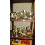 A mixed lot of metalware including vases, ewer, teapot etc.