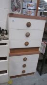 A pair of three drawer chests.