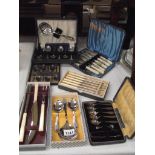 A quantity of vintage boxed cutlery sets