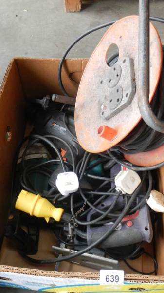 A box of extension leads, old drill spares etc., (Collect only).