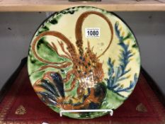 A signed Spanish majolica plate featuring a lobster ****Condition report**** Crazing