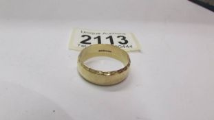 A 9ct gold wedding ring, size Z, 6.8 grams.