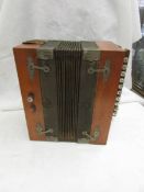 A vintage accordian (needs repair to fretwork panel but parts there).