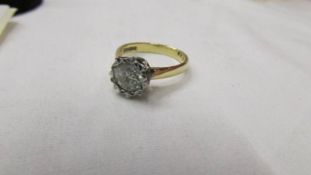 An 18ct gold 1 carat diamond ring. size L.