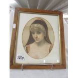 A framed and glazed Victorian print in and oak frame, in good condition.