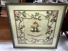 A framed & glazed souvenir De Belgique silk tapestry (54cm x 53cm)