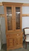 A pine glazed top bookcase (Collect only)