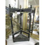 A cast iron corner stick stand,