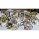 12 Royal Doulton collector's plates.