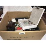 A large box of costume jewellery