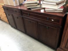 A Nathan dark wood stained 2 drawer, 4 door sideboard, 165 x 46 x73 cm high.