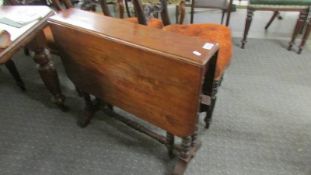 A Victorian mahogany Sutherland table.