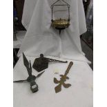 A rare chain counter balance, a church staff finial, a spit bracket and a bronze church finial.