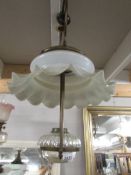 A hanging oil lamp with glass font and large shade, no burner,