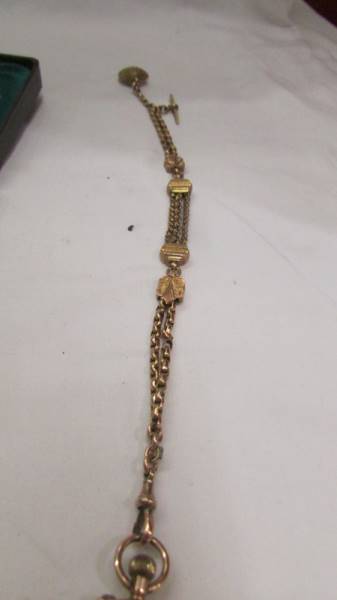 A 9ct gold ladies fob watch on an ornate 9ct gold Albertine, in working order. - Image 4 of 6