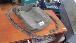 An old knapsack and one other item.