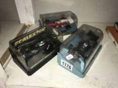 3 boxed Scalextric cars,