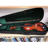 A cased Westwood violin with bow in case