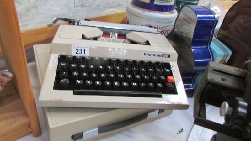 A Maritso 30 portable typewriter,