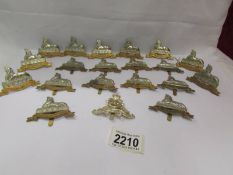 19 modern 'Egypt' cap badges and one other.