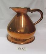A copper half gallon jug.