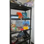 Four shelves of workshop tools and sundries including a "Bricky" and a Dustbuster.