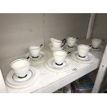 A Royal Albert white tea set with black lining