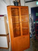 A G Plan teak corner cabinet with 2 glazed and 2 panelled doors. (Collect only).