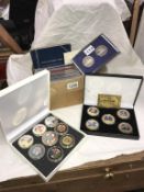 A collection of UK coin sets,