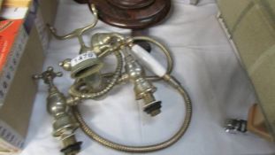 A used brass effect vintage style bath mixer taps with shower attachment